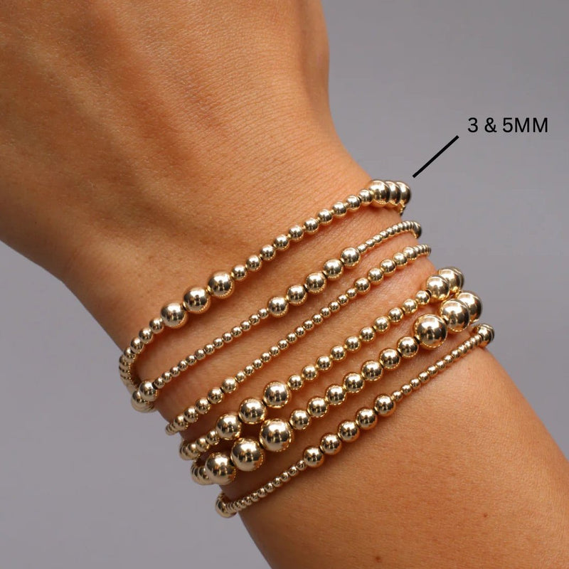 Karen Lazar  - 3 mm and 5 mm Pattern Signature Yellow Gold Filled Bead Flex Bracelet