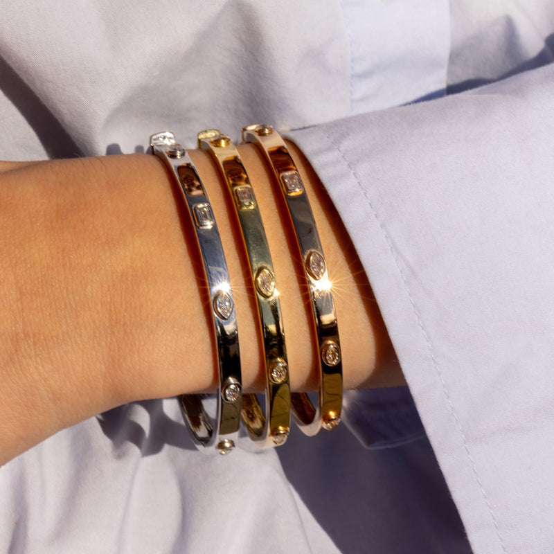 norman-silverman-bezel-set-diamond-bangle-bracelet-18k-yellow-white-and-rose-gold_f3ff9a77-d792-4031-9927-e50558f13fc9