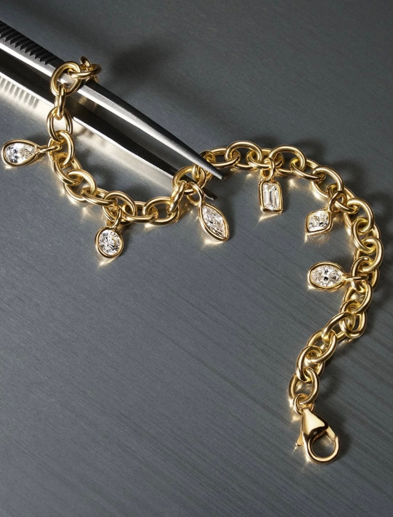 norman-silverman-fancy-shape-diamond-charm-bracelet-B2749