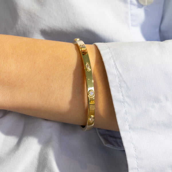 norman-silverman-mixed-shapes-bezel-set-bangle-bracelet-18k-yellow-gold-B4231_1