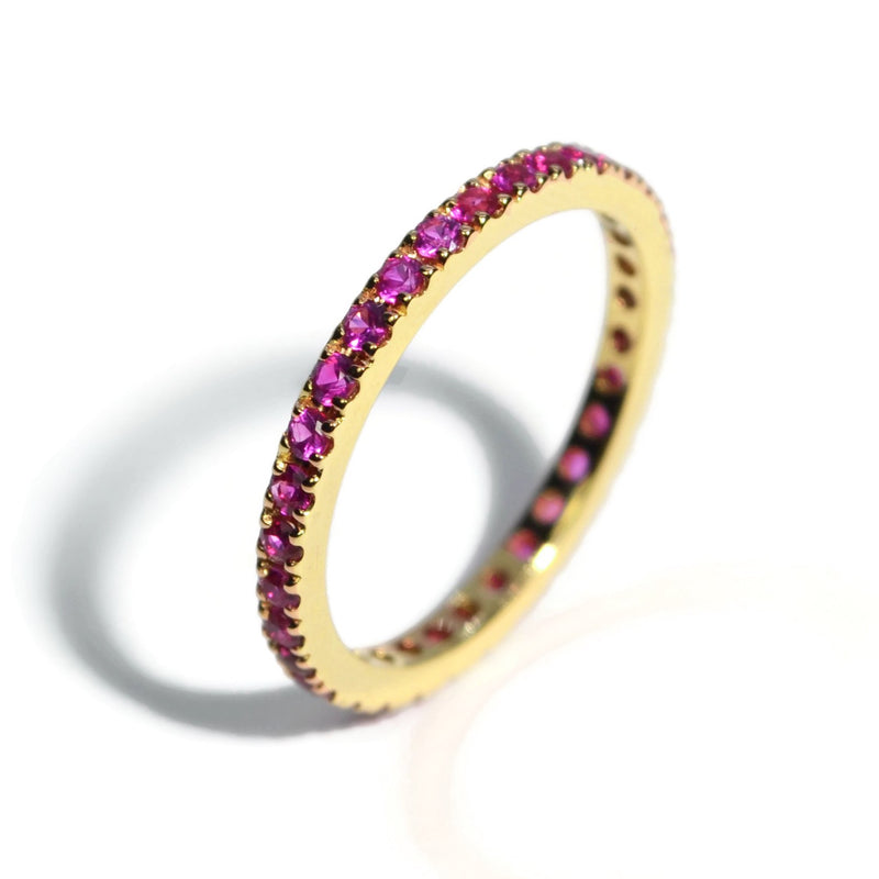 a-furst-france-eternity-band-ring-vivid-pink-sapphires-yellow-gold-A1290G4RV